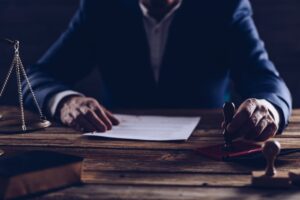 A notary public or judge reading a testament, symbolizing legal processes and the importance of law